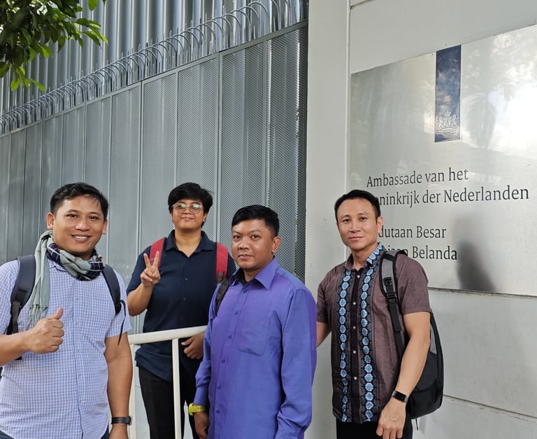 Crew standing in front of the Embassy of the Kingdom of the Netherlands in Jakarta, after visa app.