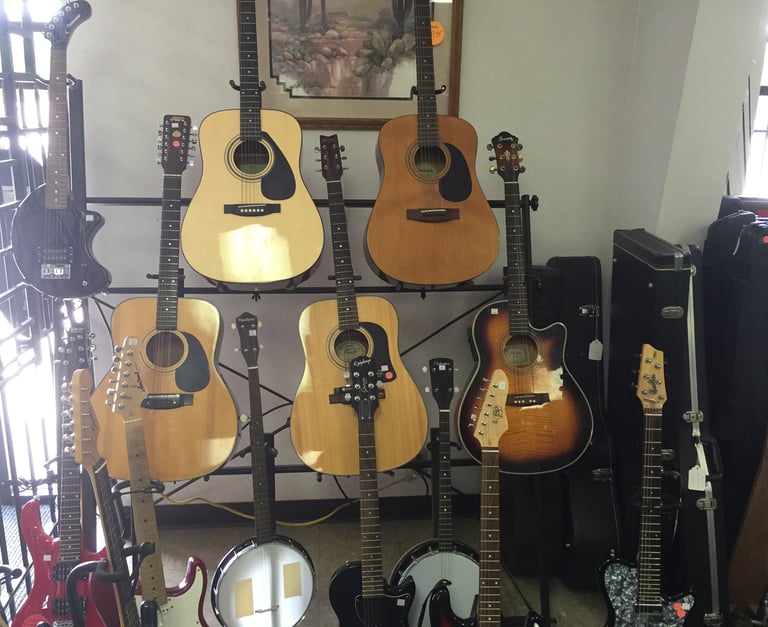 Guitars For Sale,we pawn guitars,we buy guitars