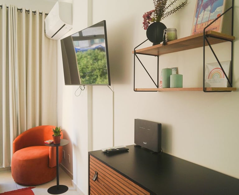 a television screen with a television and a chair