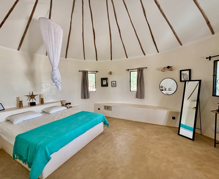 Chambre supérieure de l'hôtel de luxe Maison Fimela situé dans le Sine Saloum