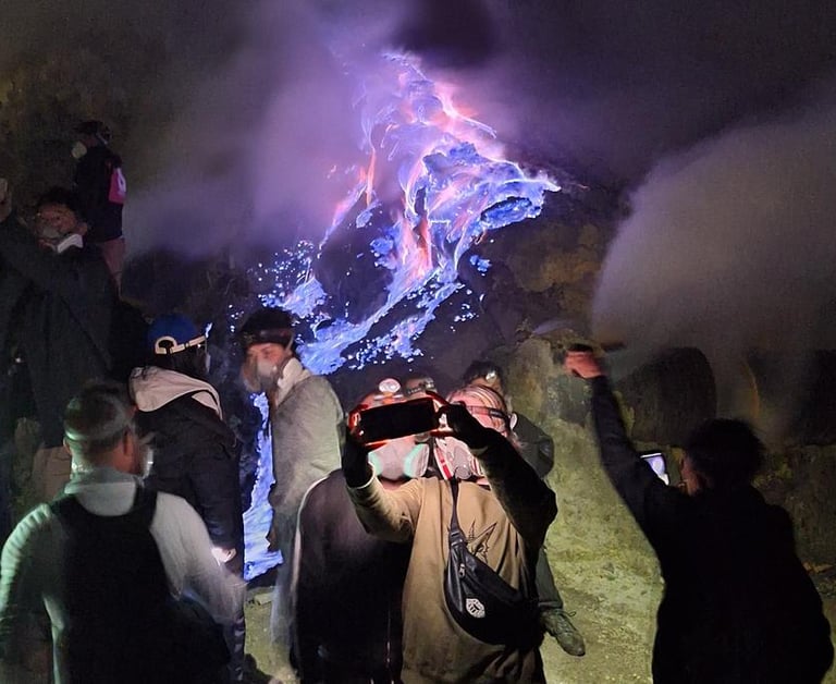 Hiker at Blue Fire at Mt. Ijen Crater