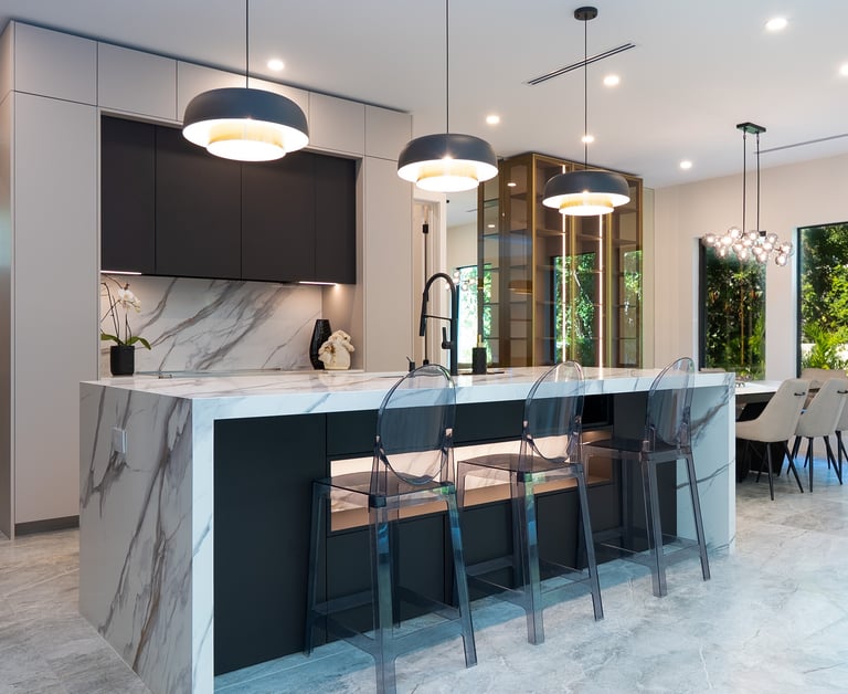 European chef's kitchen with Fulgor Milano appliances and large island at 2413 Clematis St.