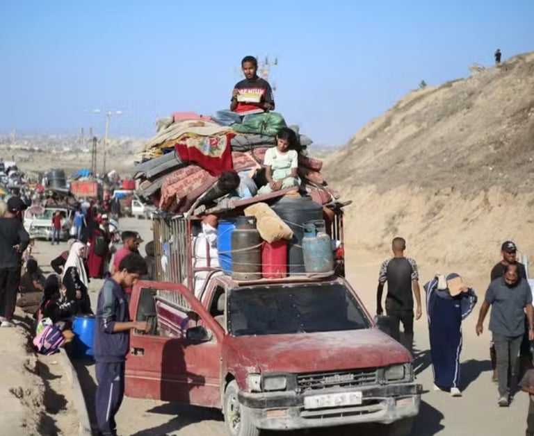 a truck with a lot of people on it