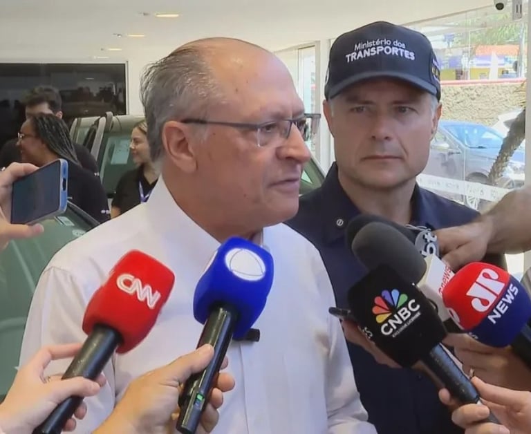 a man in a white shirt and a man in a blue shirt
