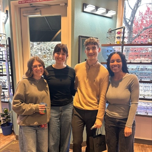 Team members from Edge Optics Fort Collins smiling inside the office