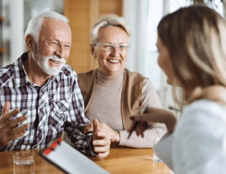 an older couple talking to their doctor