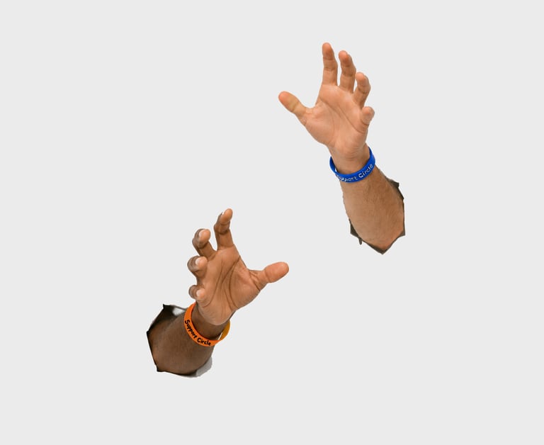 Two hands breaking through a white wall to symbolise overcoming mental health barriers 