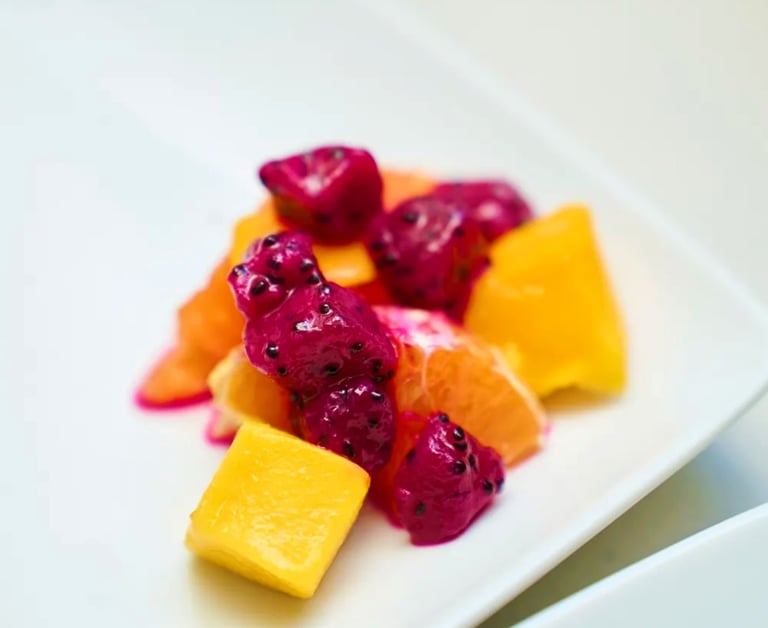 Tropical fruit salad with dragonfruit, mango, pineapple, and cara cara orange. Personal Chef near me
