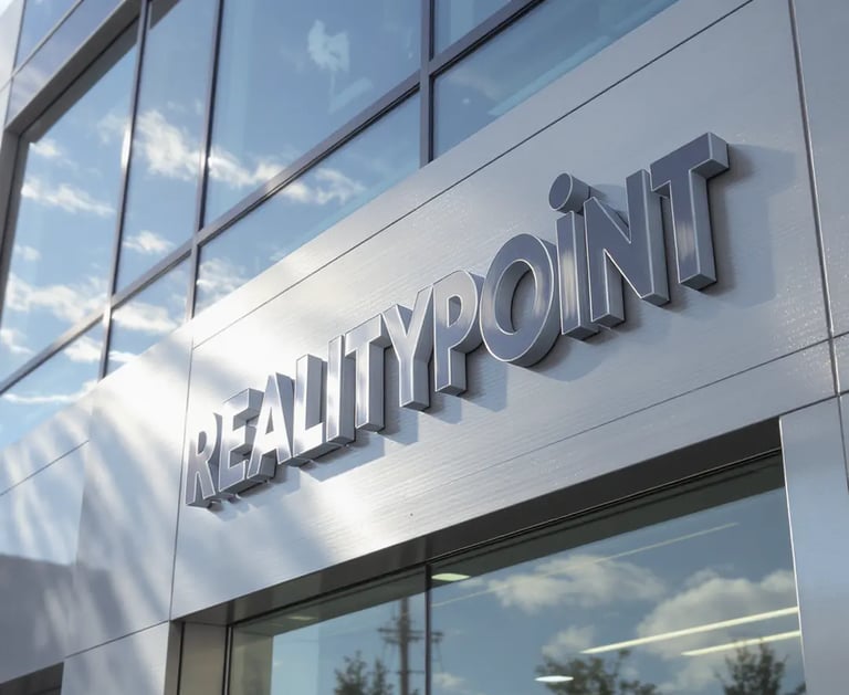 front view of building sign board name Reality Point