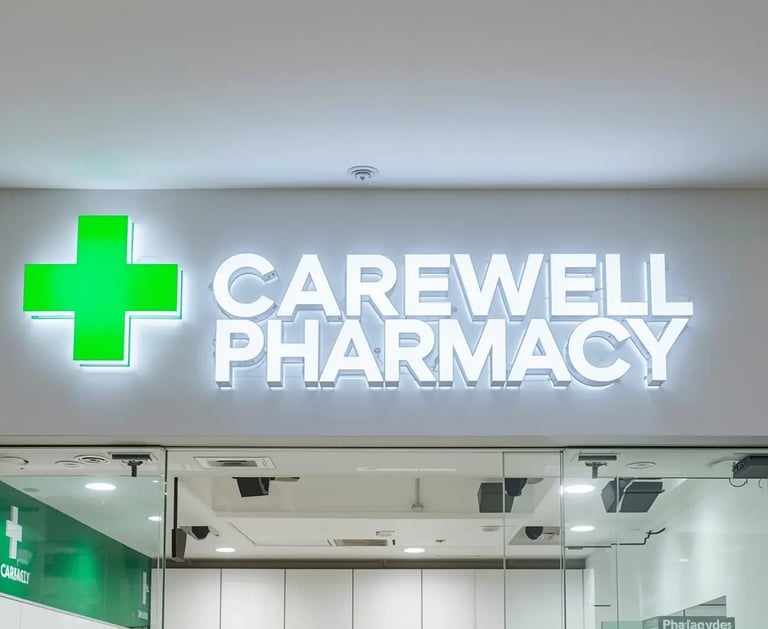 a sign that says carewell pharmacy