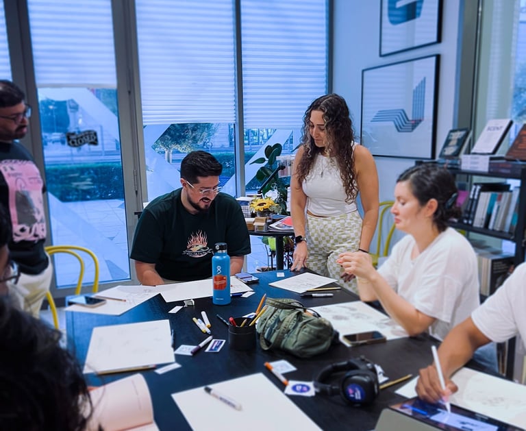 Judy hosting a Shu Neue meetup standing next to other designers and creatives