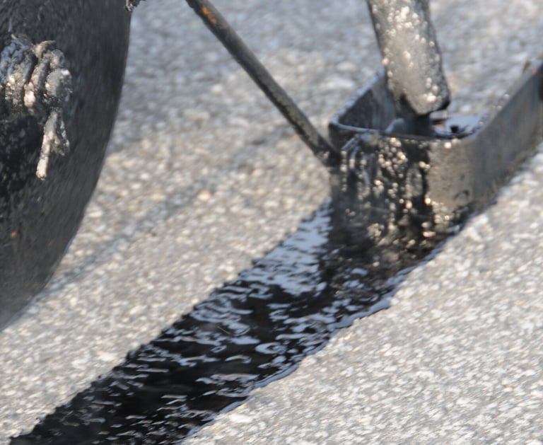 The Science Behind Effective Crack Sealing - Chattahoochee Valley Sealcoating