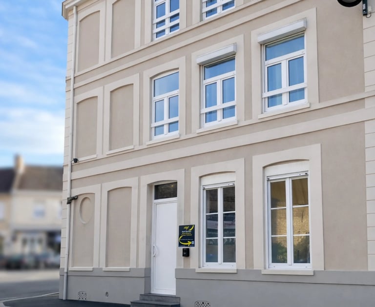 Renovated city-center building facade, corporate housing in Dunkirk