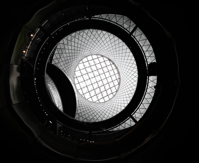a circular glass window with a skylight