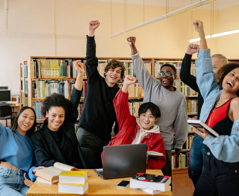 group-of-students-raising-their-hands-for-success