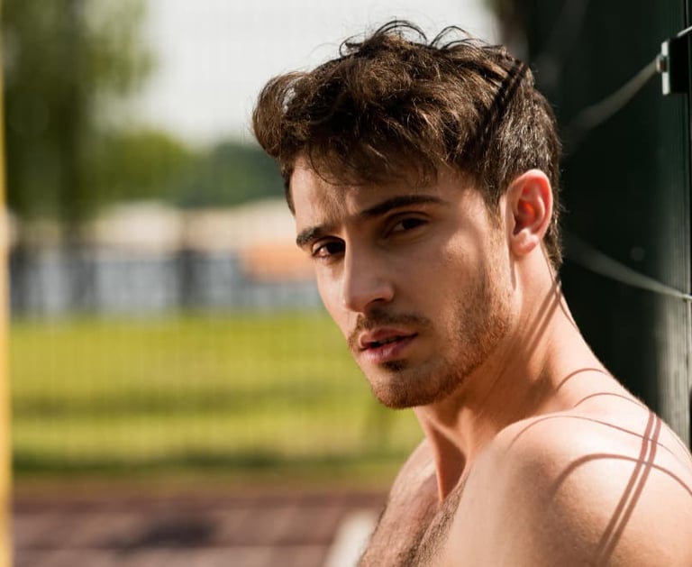 a sugar baby with a shirtless shirt on a baseball field