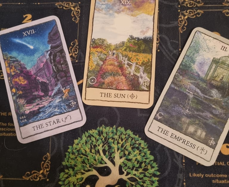 three major acana tarot cards, the star, the sun, the lovers