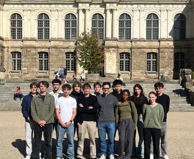a group of people standing in front of a building