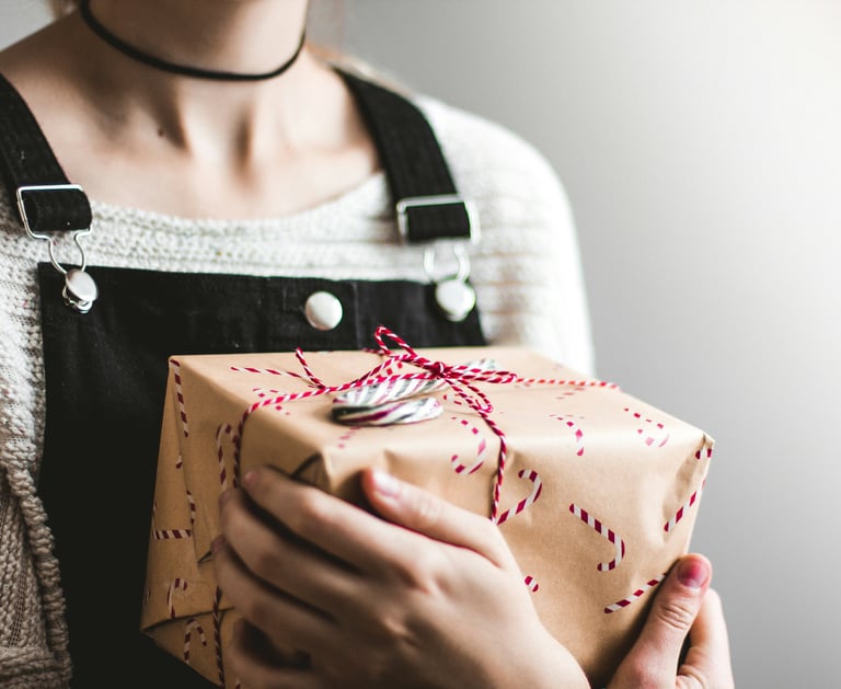 Girl is holding a gift