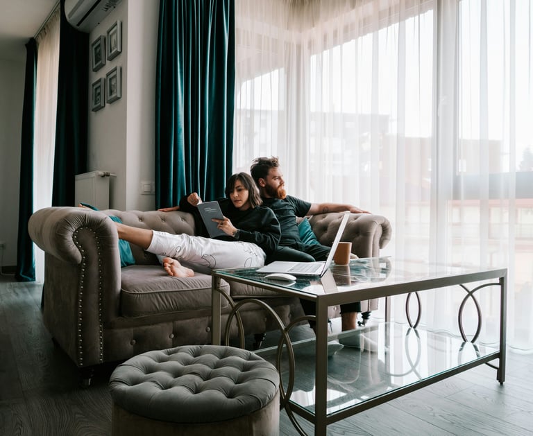Couple is resting on the coach
