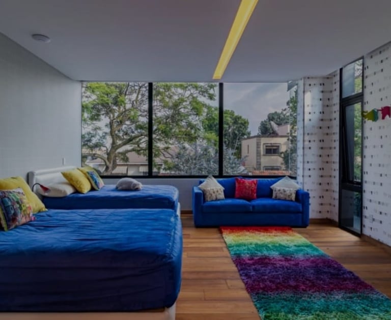 a living room with a couch and a television