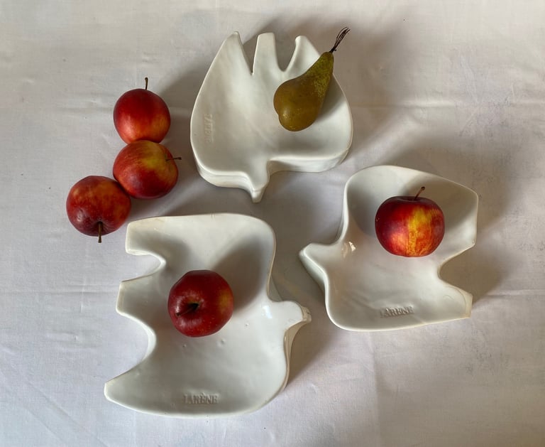 a group of fruit and a pear tree
