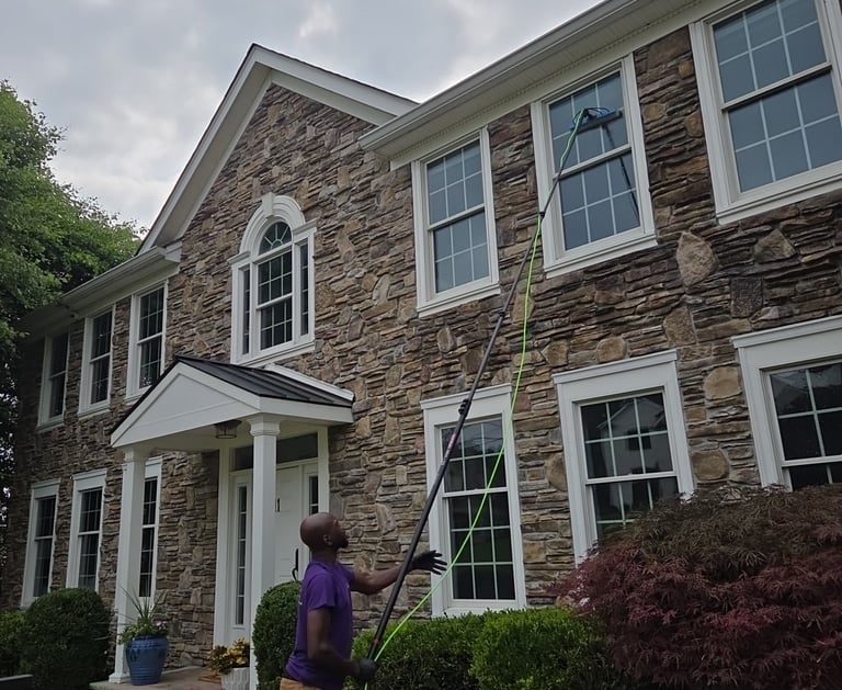 Water fed pole window cleaning for homes