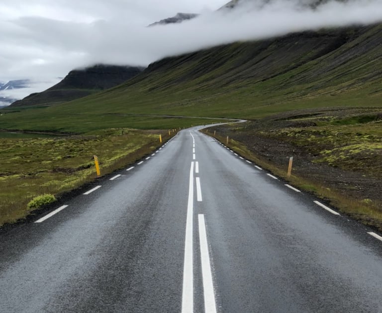 A picturesque road through fjords, from our own travels