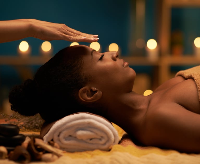 a woman getting a massage at a spa with reiki