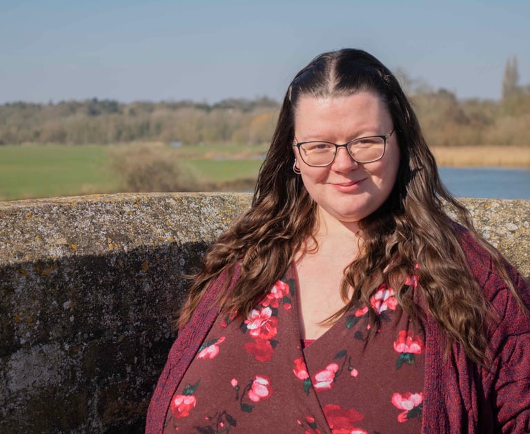 kate-accounts-manager-at-artful-accountancy-wearing-a-dress-and-cardigan-head-and-shoulders-standing