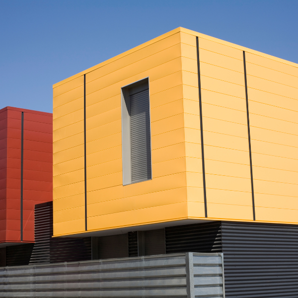 a building with a yellow and red building with a red and yellow building in the