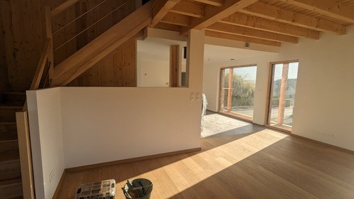 a room with a staircase and a staircase