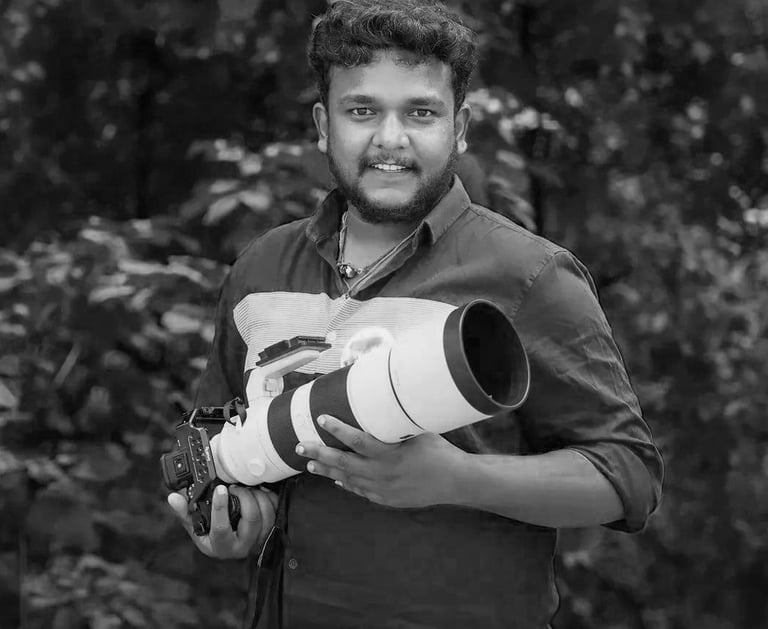 a man holding a camera | wedding photography | The Artfull Studio | Bengaluru