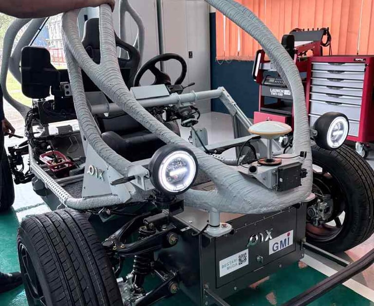 Engineers inspect a custom autonomous electric vehicle prototype with a roll cage and sensor suite.