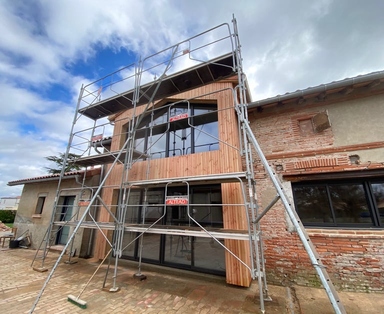 pose d'un bardage type "claire voie"