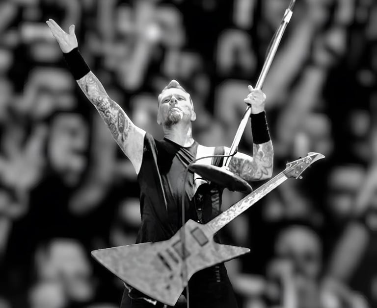 a man with a guitar and a guitar in a stadium