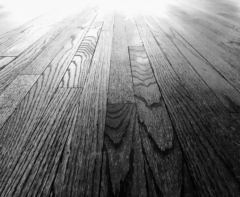 Close up texture of dustless sanded hardwood grain showing smooth finish