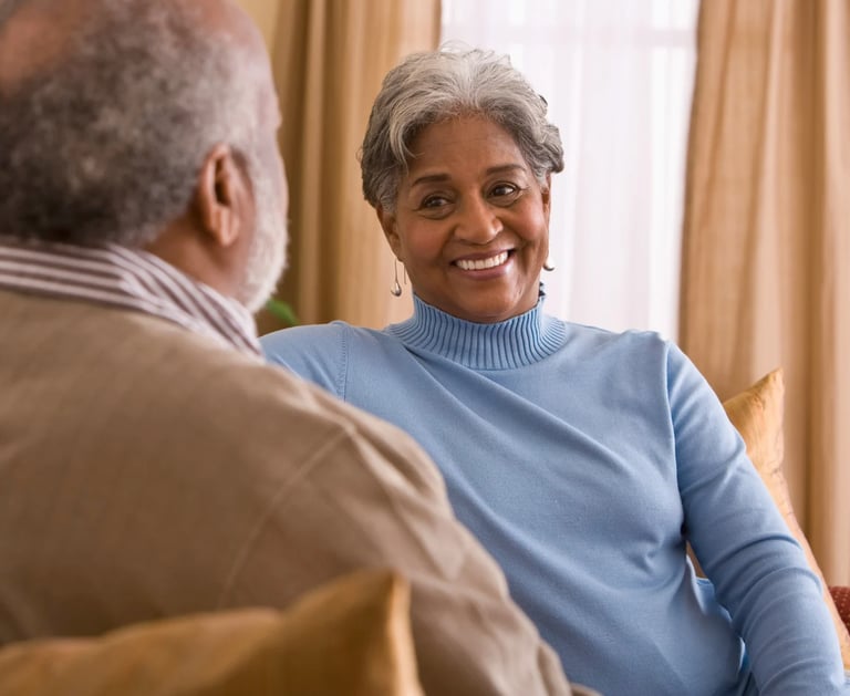 happy older couple having a discusion