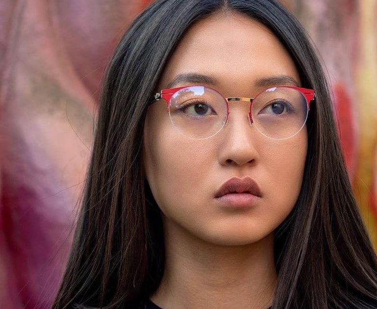Woman wearing designer frames