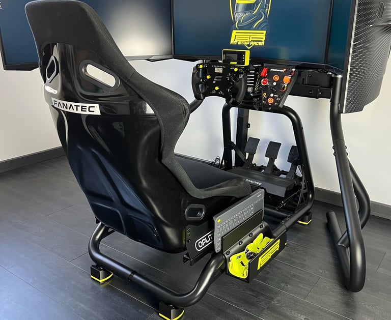 a racing simulator with a steering wheel and a steering wheel