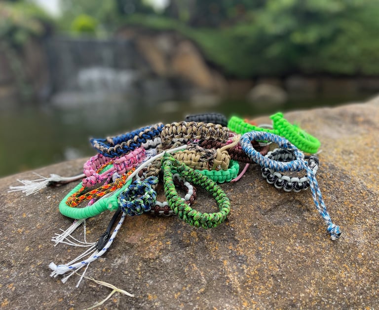 A scene with paracord products on a rock