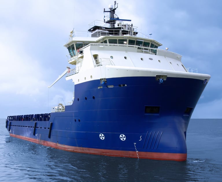 a large ship with a large blue and white ship