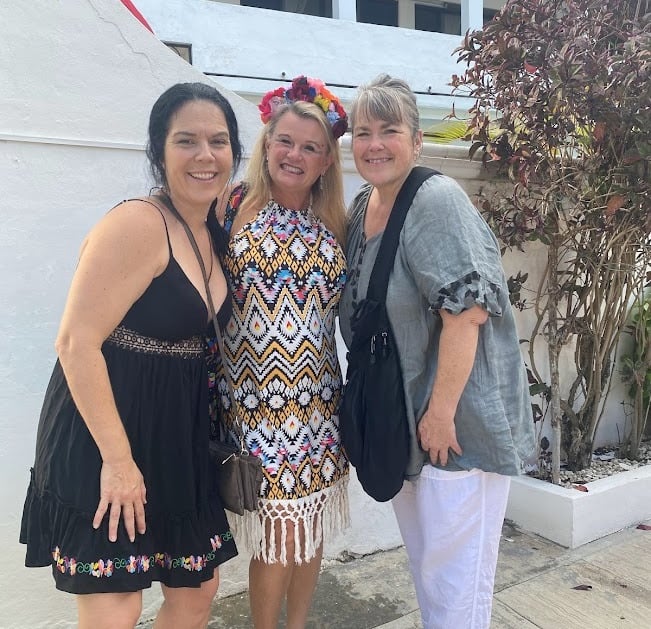 three women standing next to each other. Day of the Dead Retreat