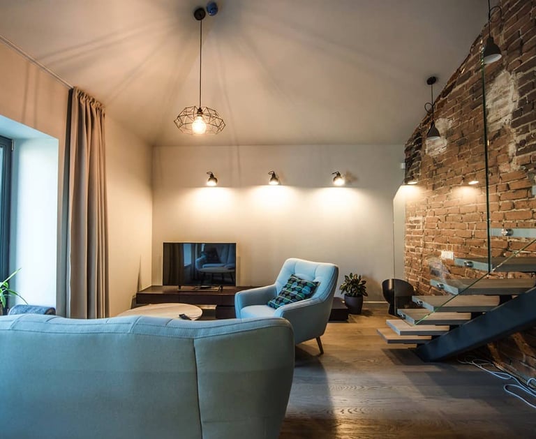 Smėlio spalvos naktinės užuolaidos interjere