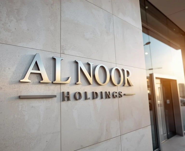a sign that says all noor holding up to the name of the company