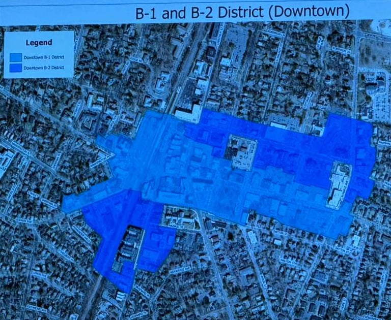 Satellite map of downtown Ridgewood. A blue B1 and B2 overlay sits above.