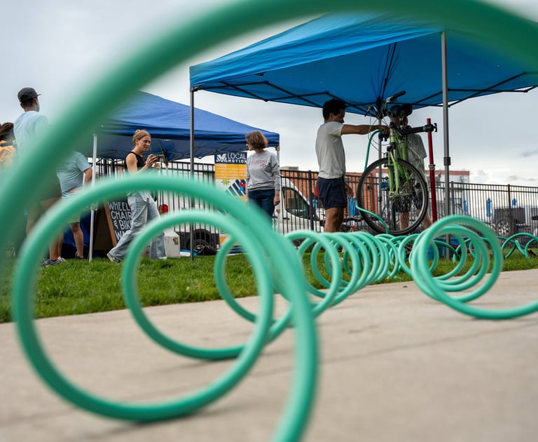 Close-up of the hose with the event in the background