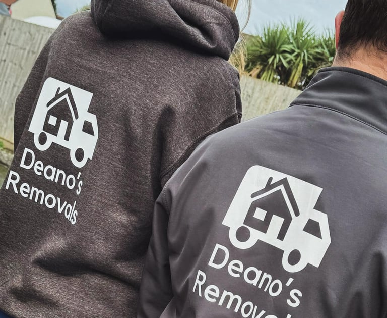 2 deanos removals workers in company jumpers