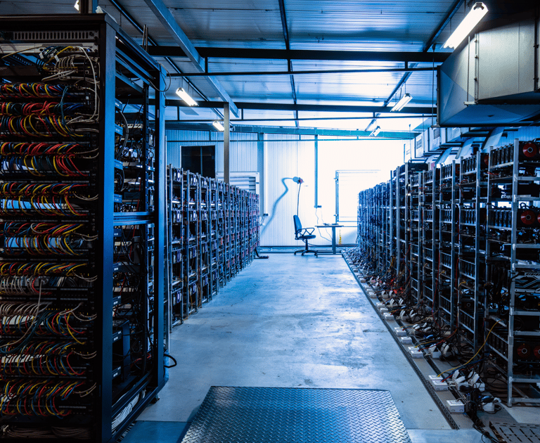 a server room with a lot of wires and wires