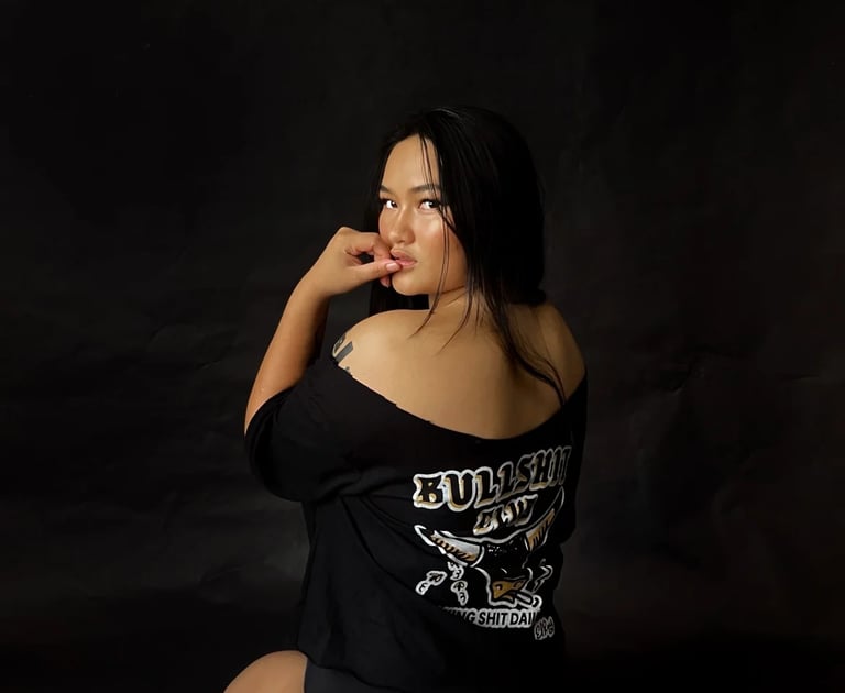 Woman posing in a black t shirt